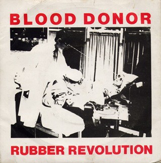Blood Donor – Rubber Revolution (7″, Single, Red) (Very Good Plus (VG+)) – 39164
