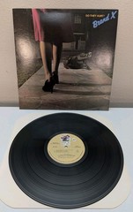 Brand X Do They Hurt? 1980 Passport Records LP Jazz Fusion Phil Collins Drums