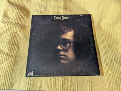 vintage vinyl Elton John’s 1970 self-titled album on the UNI Records label.