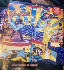 ELTON JOHN & BRANDI CARLILE – WHO BELIEVES IN ANGELS? Ltd Edit Tri-Colour Vinyl