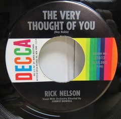 RICK NELSON 45 Record With Picture Sleeve I WONDER/IF YOUR LOVE WILL EVER BELONG