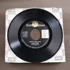 SURVIVOR – BURNING HEART / FEELS LIKE LOVE (45, 1985, CBS ZS4 05663-4) 7″ Single